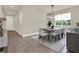 This home features a lovely dining room with modern chandelier and lots of space at 6905 Cucamelon Ct, Windermere, FL 34786