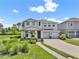 Charming two-story home with a well-manicured lawn and inviting curb appeal at 6905 Cucamelon Ct, Windermere, FL 34786