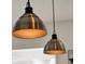 Stylish pendant lights with warm illumination add character to the interior space at 6905 Cucamelon Ct, Windermere, FL 34786