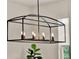 Contemporary chandelier providing ample lighting and a focal point for the room at 6905 Cucamelon Ct, Windermere, FL 34786