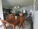 Open-concept dining area connects to kitchen and living spaces, ideal for entertaining at 744 Barron Pl, The Villages, FL 32163