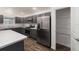 Well-equipped kitchen featuring stainless steel appliances, ample cabinetry, and a pantry at 744 Barron Pl, The Villages, FL 32163