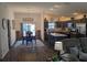 Open-concept floorplan with a kitchen, dining area, and living room at 744 Barron Pl, The Villages, FL 32163