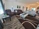 Spacious living room featuring modern furnishings and stylish decor at 744 Barron Pl, The Villages, FL 32163