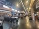 Spacious marketplace interior showcasing various food and beverage stations with ample seating at 744 Barron Pl, The Villages, FL 32163