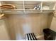 Walk-in closet with shelving and luggage rack at 7528 Brooklyn Dr, Kissimmee, FL 34747