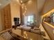 Spacious living room with high ceilings, decorative fireplace and contemporary decor at 7528 Brooklyn Dr, Kissimmee, FL 34747