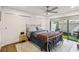 Bedroom features large window and two closets at 108 Crown Oaks Way, Longwood, FL 32779