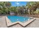 Enjoy the community pool with inviting layout, ample decking, and surrounding greenery at 108 Crown Oaks Way, Longwood, FL 32779