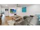 Comfortable living room featuring modern furniture, wood floors, and a mounted TV at 108 Crown Oaks Way, Longwood, FL 32779