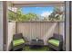 Private patio with outdoor seating surrounded by landscaping at 108 Crown Oaks Way, Longwood, FL 32779