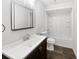 Clean bathroom with a modern vanity, a framed mirror, and a shower-tub combination at 1122 Romar Ln, Apopka, FL 32712
