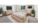 Serene bedroom featuring stylish furniture, soft lighting, and a peaceful atmosphere at 1122 Romar Ln, Apopka, FL 32712