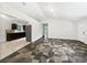 Open-concept living area features stylish floors and views into the updated kitchen with stainless appliances at 1122 Romar Ln, Apopka, FL 32712
