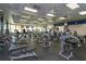 Well-equipped fitness center with various machines, weights, and ample workout space at 11834 Gennaro Ln, Orlando, FL 32827