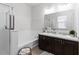Bathroom featuring a soaking tub, shower, and double sink vanity at 12084 Sumter Dr, Orlando, FL 32824
