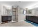 Spacious bathroom with dual sinks, granite countertops, and a glass shower enclosure at 1270 Fountain Coin Loop, Orlando, FL 32828