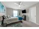 Well-lit bedroom featuring a comfortable bed and modern decor at 1270 Fountain Coin Loop, Orlando, FL 32828
