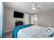 A bright bedroom with a television and ceiling fan at 1270 Fountain Coin Loop, Orlando, FL 32828