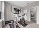 Exercise room featuring an exercise bike, elliptical, and neutral paint at 1270 Fountain Coin Loop, Orlando, FL 32828