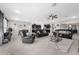 Open-concept living space flows from the kitchen to the dining area, and living room at 1270 Fountain Coin Loop, Orlando, FL 32828