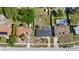 Bird's eye view showcases home exteriors, driveways, and an enclosed private backyard pool at 1432 Findlay St, Deltona, FL 32725
