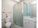Compact bathroom with a shower, vanity, toilet, and tiled flooring at 1432 Findlay St, Deltona, FL 32725