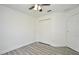 Bedroom with light gray wood flooring, ceiling fan, and white doors and trim at 1502 W 16 Th Street, Sanford, FL 32771