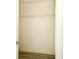 Bright bedroom closet with a wire shelf and hardwood flooring at 1502 W 16 Th Street, Sanford, FL 32771