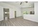 Open-concept living space with kitchen and access to back patio at 1502 W 16 Th Street, Sanford, FL 32771