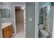 Bathroom featuring a vanity, toilet, and shower with colorful curtain and neutral paint at 1528 Langham Ter, Lake Mary, FL 32746
