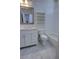 Bathroom featuring a white vanity with a marble countertop, tile floors, and a tub shower at 1528 Langham Ter, Lake Mary, FL 32746