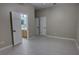 Empty bedroom featuring multiple closets and access to ensuite bathroom at 1528 Langham Ter, Lake Mary, FL 32746