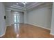 Open floor plan features hardwood floors, crown molding and french doors for indoor/outdoor living at 1528 Langham Ter, Lake Mary, FL 32746