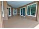 Expansive covered patio area with multiple access points, perfect for outdoor entertaining at 1528 Langham Ter, Lake Mary, FL 32746