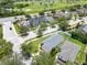 Aerial view of a neighborhood showcasing houses, golf course, landscaping and green spaces at 1531 Tiverton Blvd, Winter Garden, FL 34787