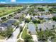 Beautiful aerial view of a neighborhood with lush green lawns and beautiful landscaping at 1531 Tiverton Blvd, Winter Garden, FL 34787