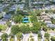 Aerial view of the neighborhood playground featuring mature trees and a picnic shelter at 1531 Tiverton Blvd, Winter Garden, FL 34787