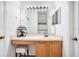 Bright bathroom featuring vanity, mirror, and plenty of storage space at 1531 Tiverton Blvd, Winter Garden, FL 34787