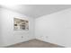 Neutral bedroom featuring a window with wood-look blinds at 1533 Ravana Dr, Orlando, FL 32822