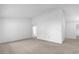 Spacious living room features neutral carpet, fresh paint, and recessed lighting at 1533 Ravana Dr, Orlando, FL 32822