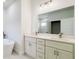 A luxurious bathroom with double vanity, modern fixtures, and a sleek freestanding bathtub for ultimate relaxation at 15625 Sw 37Th Cir, Ocala, FL 34473