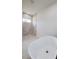 Modern bathroom featuring a freestanding tub, walk-in shower with marble tile, and contemporary fixtures and lighting at 15625 Sw 37Th Cir, Ocala, FL 34473
