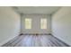 A spacious bedroom bathed in natural light featuring neutral walls and modern flooring creates a serene atmosphere at 15625 Sw 37Th Cir, Ocala, FL 34473