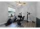 This exercise room features wood flooring, and a ceiling fan at 1640 Wild Indigo Ter, Oviedo, FL 32766