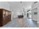 Spacious living area with wood floors, neutral decor, and an open layout at 1640 Wild Indigo Ter, Oviedo, FL 32766
