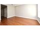 Bedroom with hardwood floors and neutral paint, providing a serene atmosphere at 1649 Lake Baldwin Ln, Orlando, FL 32814