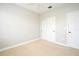 Comfortable bedroom space with carpet and white walls at 1649 Lake Baldwin Ln, Orlando, FL 32814