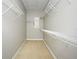 Walk-in closet with ample shelving at 1649 Lake Baldwin Ln, Orlando, FL 32814