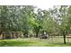 Dog park with green space and shaded areas for dogs to enjoy at 1649 Lake Baldwin Ln, Orlando, FL 32814